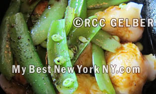 Peekytoe Crab Dumplings, Sugar Snap Peas and Aromatic Spices at Spice Market, NY.