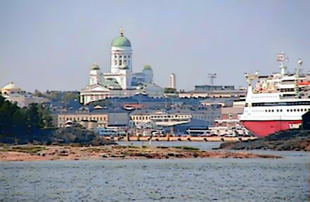 Helsinki's South Harbor with islands, ships and lanmark buildings in view.